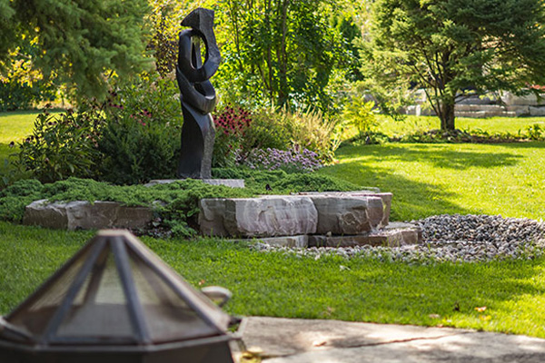 Outdoor landscape with fire pit patio ad gardens